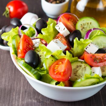 fresh-greek-salad-on-wooden-background